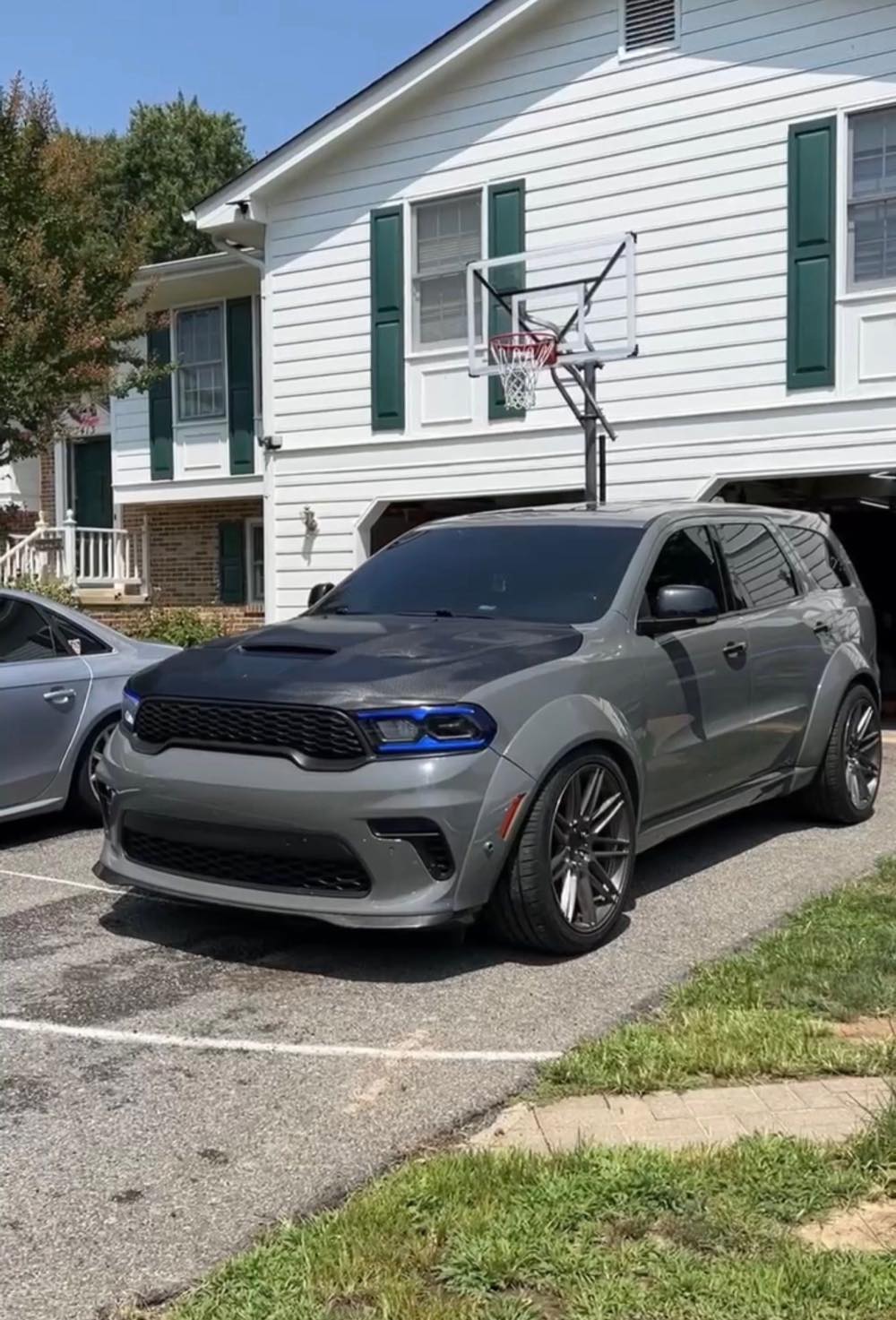 Dodge Durango SRT in a color change wrap with carbon hood